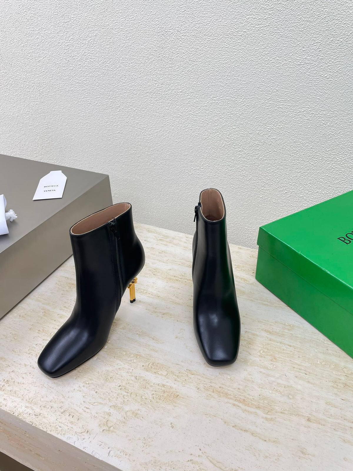 KNOT ANKLE BOOT IN BLACK CALFSKIN WITH GOLD METAL HEEL 9 CM