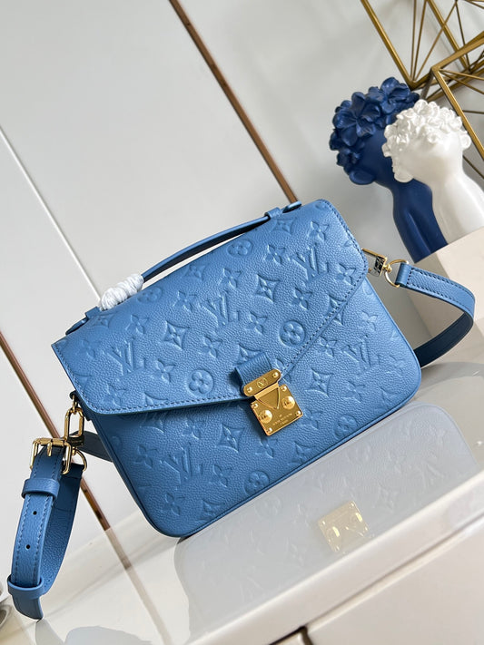 Louis Vuitton Monogram Empreinte Pochette Métis Cognac Bags Blue